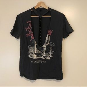 deep open “V” cut tee shirt